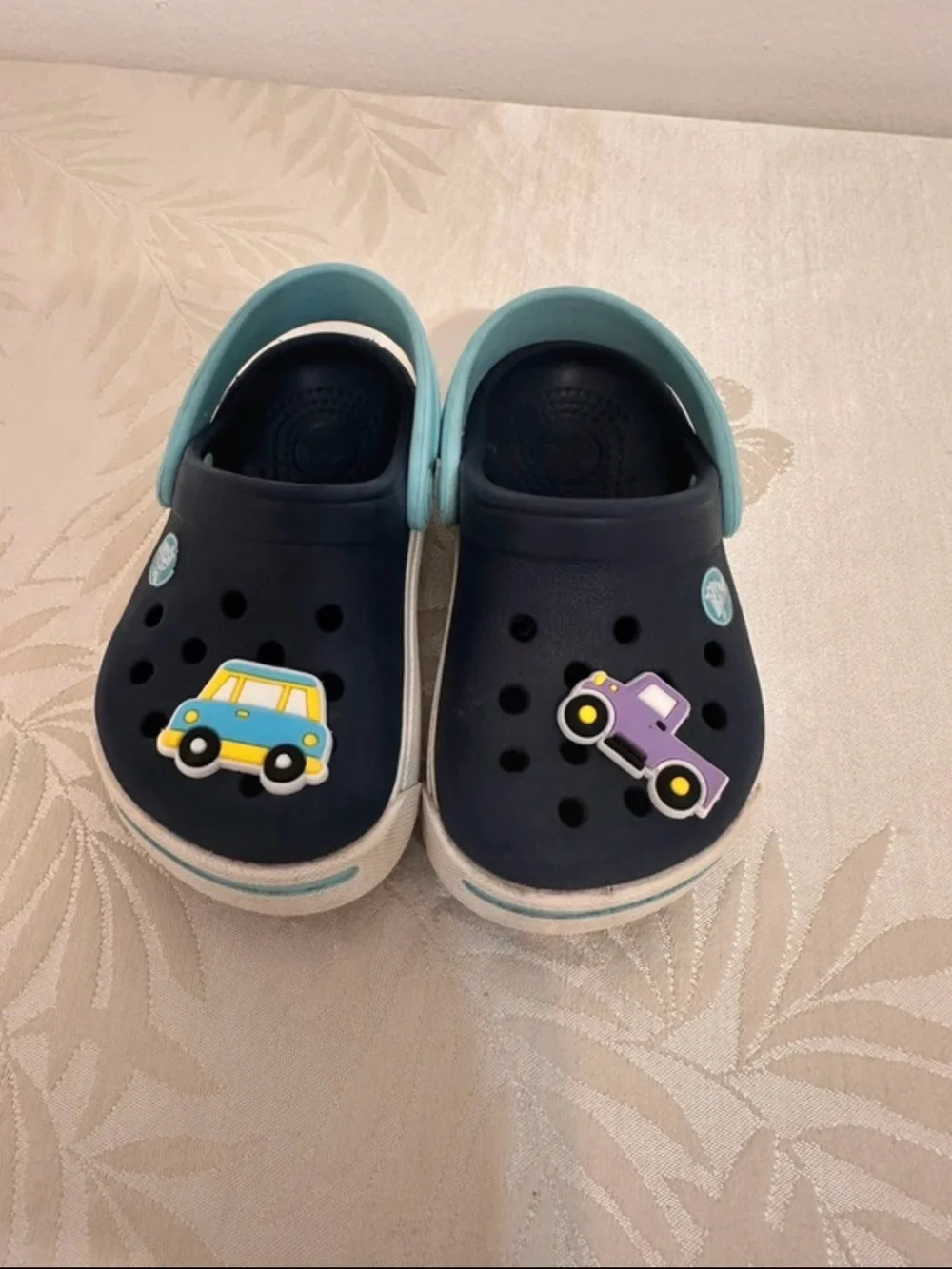 CROCS Navy Clogs with Light Blue Heel Straps and Car Charms